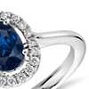 Floating Oval Sapphire and Diamond Micropave Diamond Halo Ring in 14k White Gold (7x5mm)